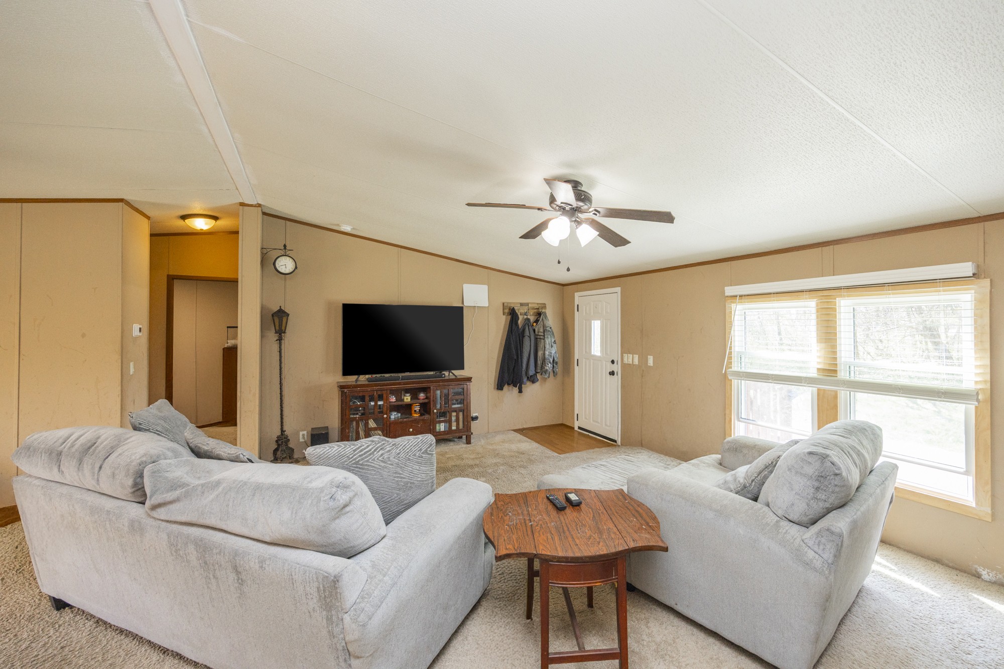 8591 Lowe Christiana Road Christiana, TN 37037 - Photo 10 of 37 a living room with furniture and a flat screen tv