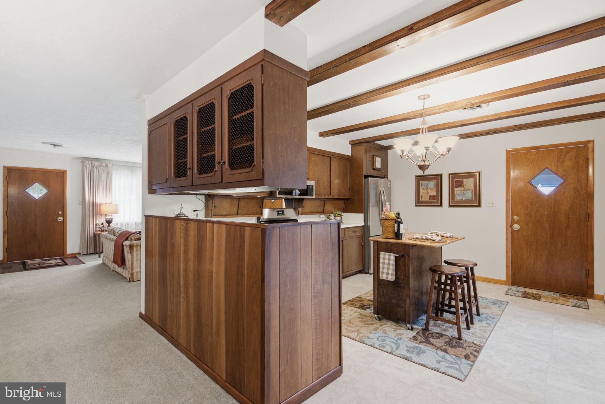 4208 Howard Road Beltsville, MD 20705 - Photo 11 of 47 Generous Cabinetry, Countertops & Carport Entry