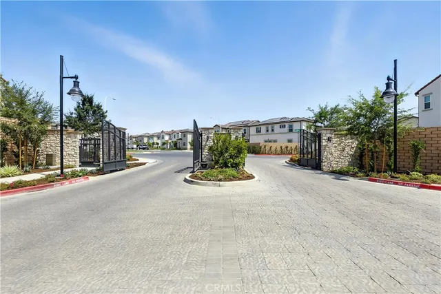 a view of a street with cars