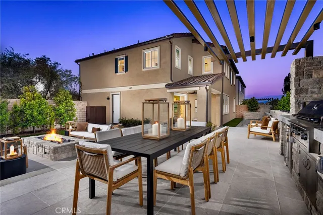 a view of a dinning tables and chairs in patio