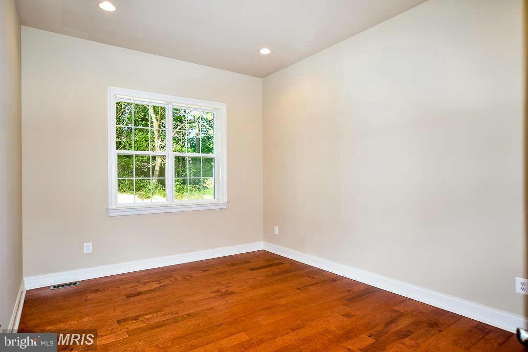 8536 Old Keene Mill Road Springfield, VA 22152 - Photo 15 of 30 an empty room with a window