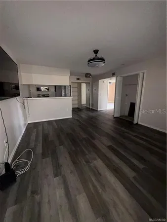 a living room with a couch and a flat screen tv