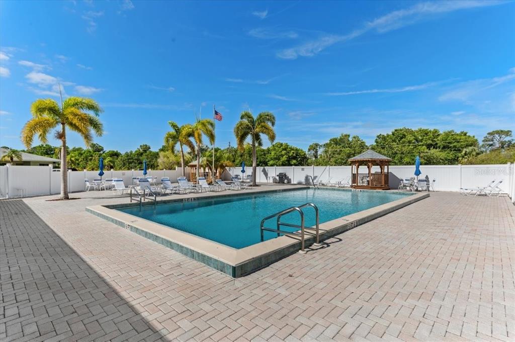 25225 Rampart Boulevard, Unit 1207 Punta Gorda, FL 33983 - Photo 30 of 40 a view of swimming pool with a lounge chair