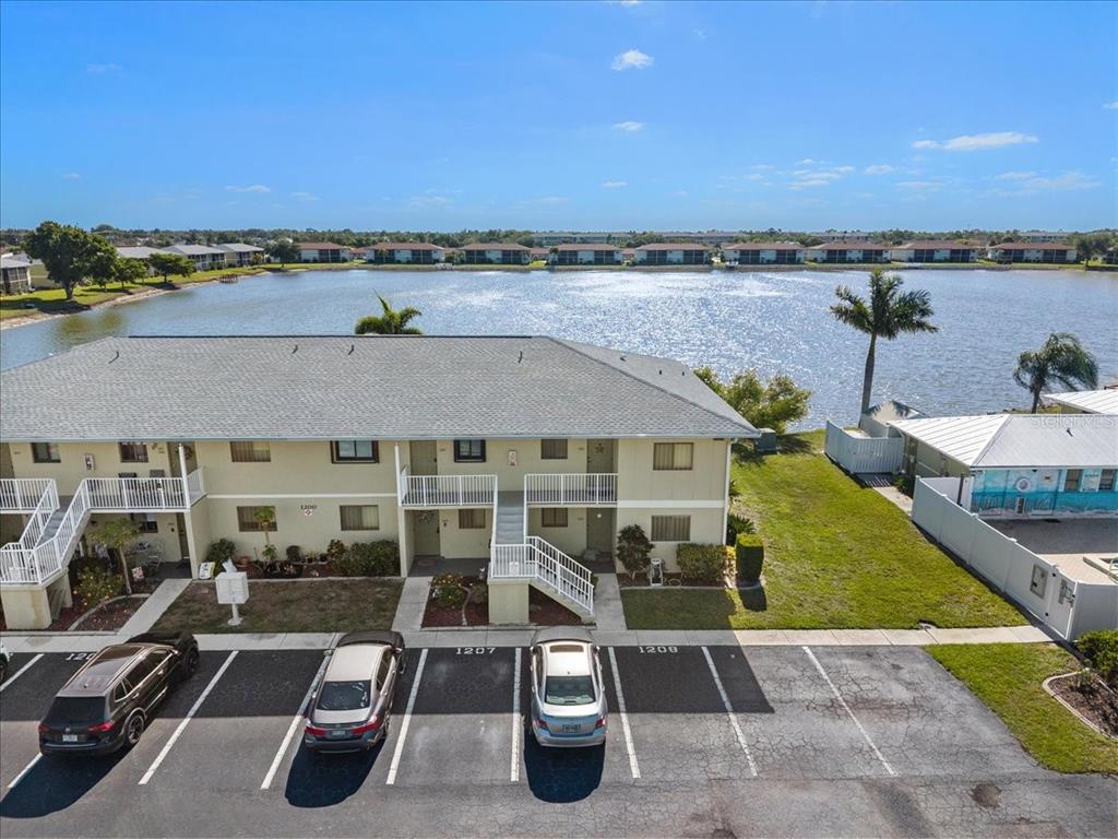 25225 Rampart Boulevard, Unit 1207 Punta Gorda, FL 33983 - Photo 36 of 40 an aerial view of a house with a garden