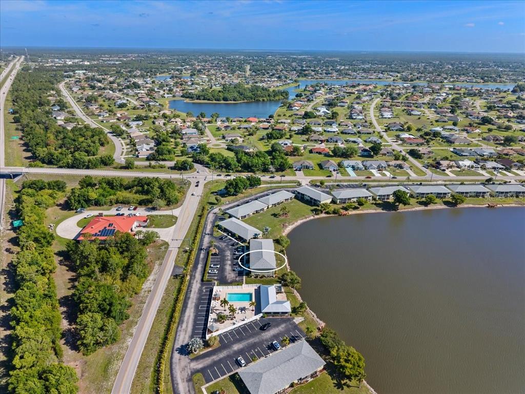 25225 Rampart Boulevard, Unit 1207 Punta Gorda, FL 33983 - Photo 38 of 40 an aerial view of a house with a yard