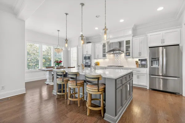 a bed room with a bed and a potted plant