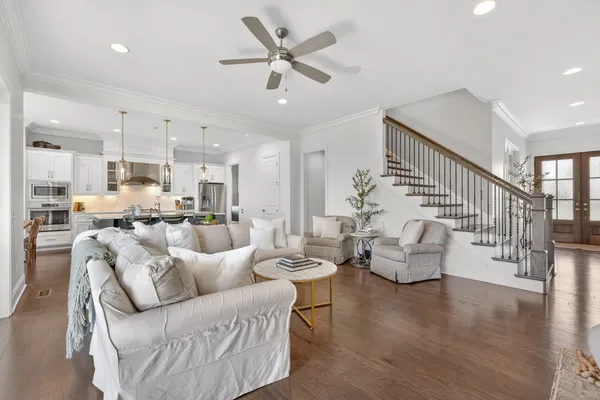 a view of a dining room with furniture and window