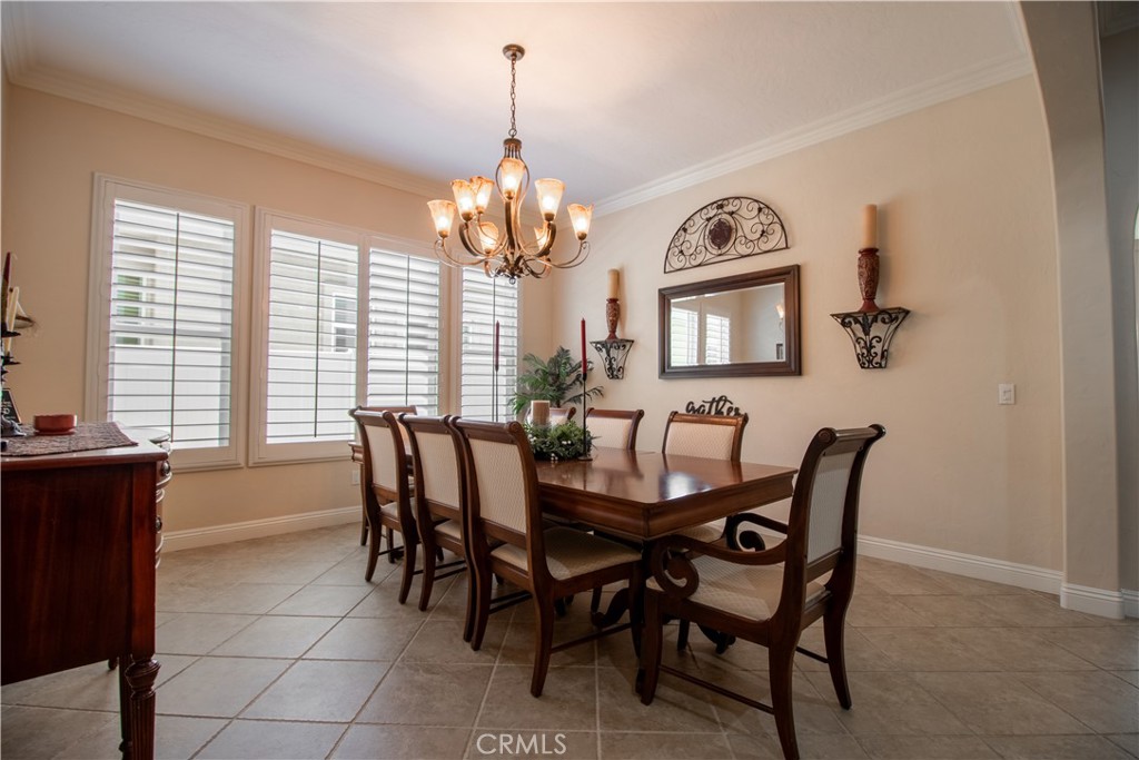 33699 Spring Brook Circle Temecula, CA 92592 - Photo 63 of 83 a view of a dining room with furniture window and outside view