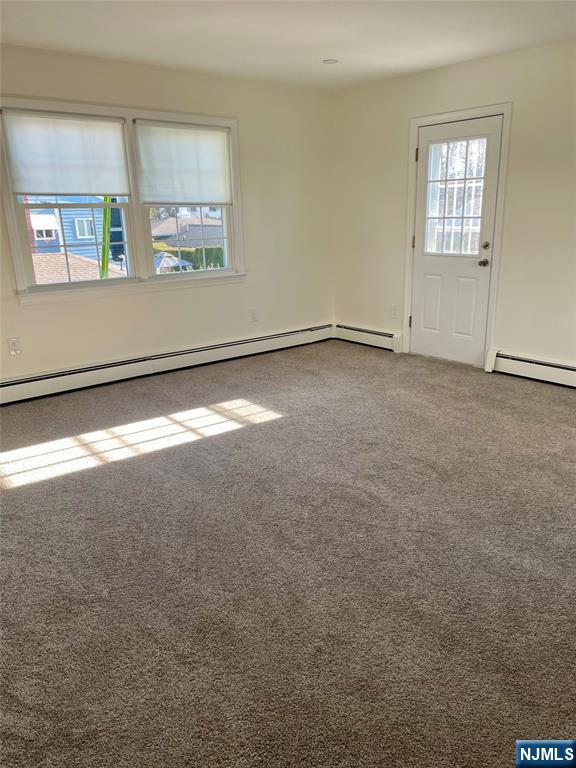 116 Post Avenue Hawthorne, NJ 07506 - Photo 15 of 18 an empty room with a window