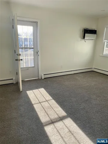 front view of a house with a garden