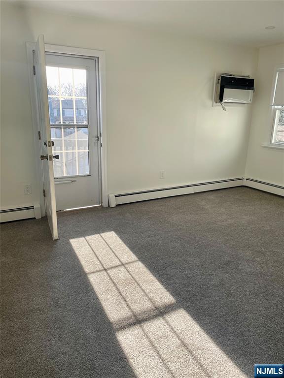 116 Post Avenue Hawthorne, NJ 07506 - Photo 16 of 18 an empty room with windows