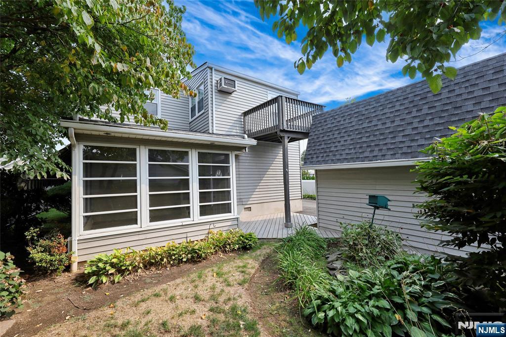 116 Post Avenue Hawthorne, NJ 07506 - Photo 18 of 18 front view of a house with a garden