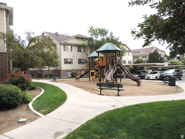 8198 North Cedar Springs Road, Unit 5 Eagle Mountain, UT 84005 - Photo 22 of 30 Communal playground with a residential view
