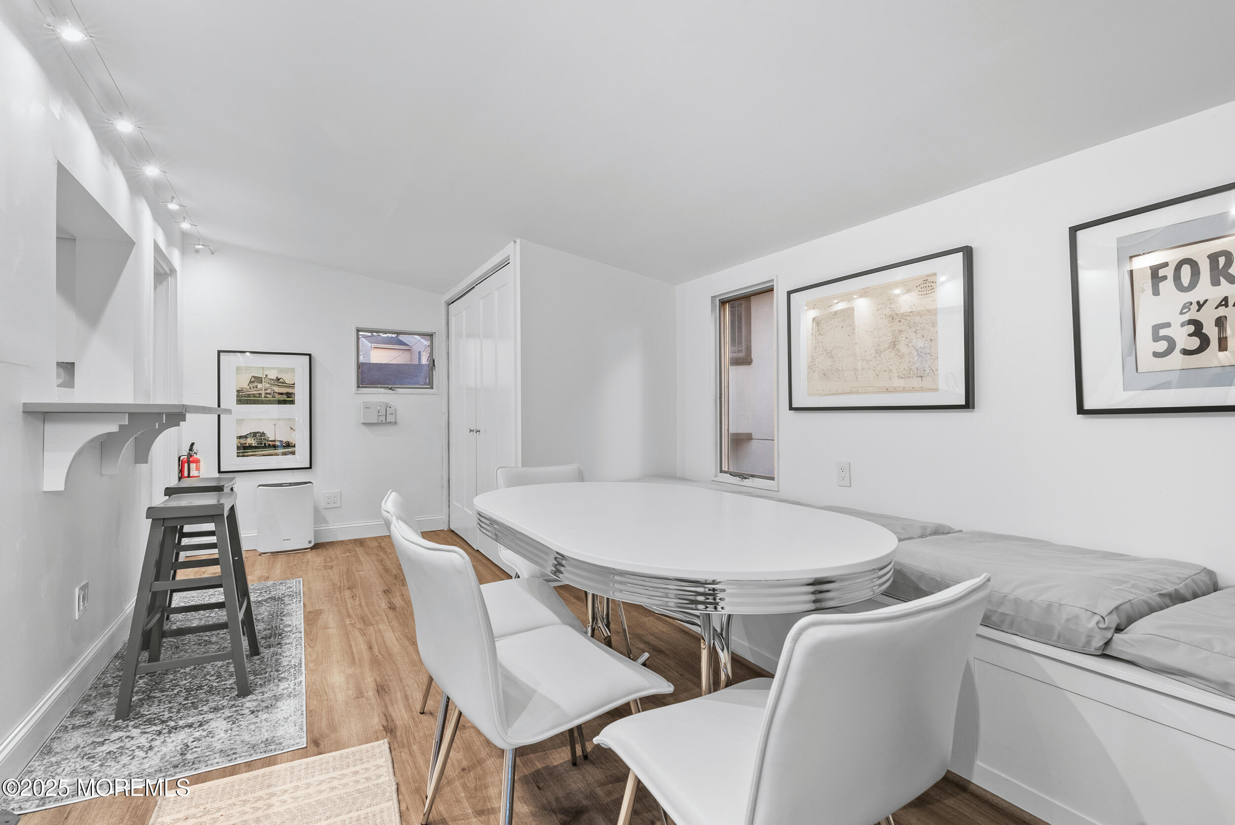 90 Deal Esplanade Deal, NJ 07723 - Photo 12 of 25 a view of a dining room with furniture