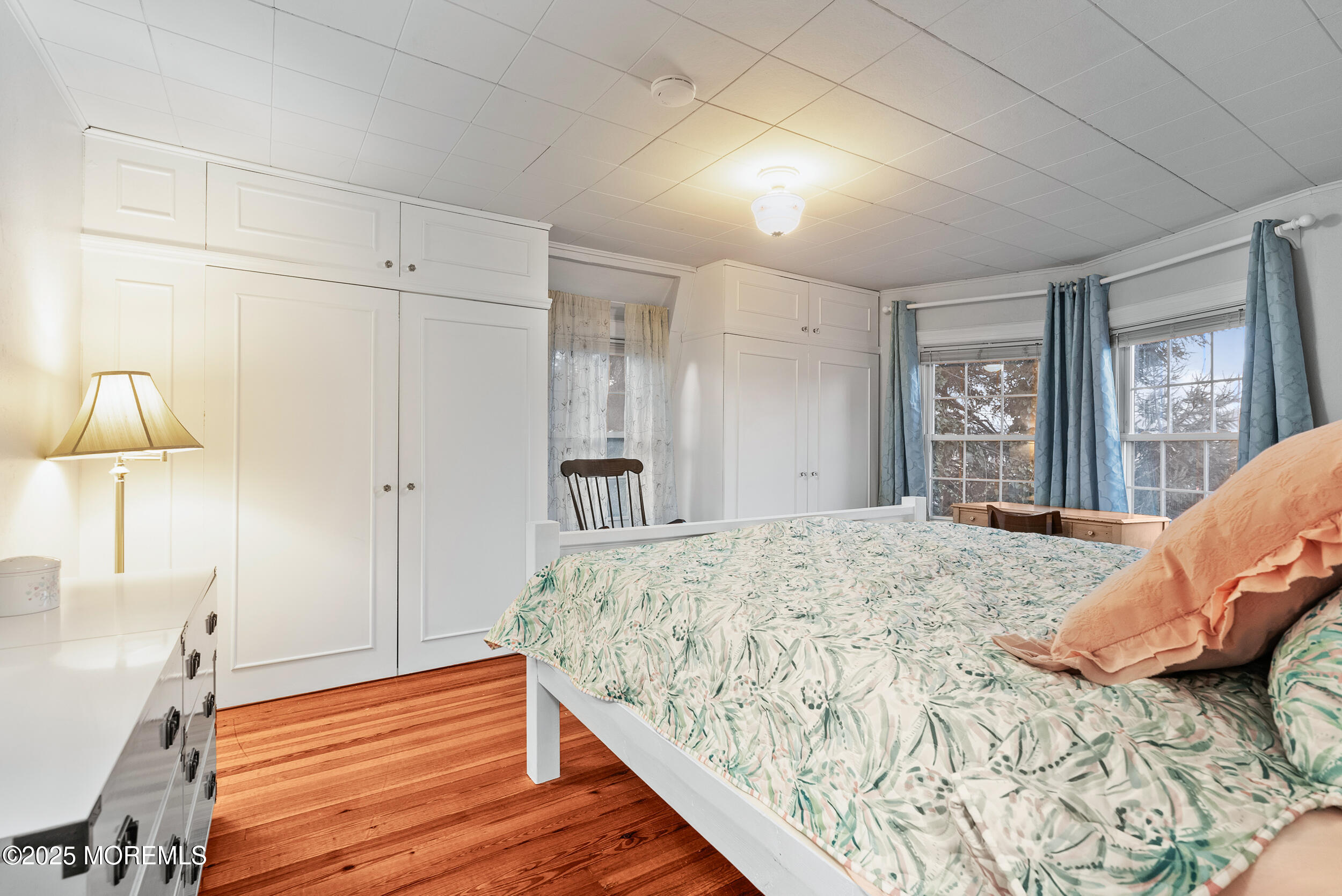 90 Deal Esplanade Deal, NJ 07723 - Photo 14 of 25 a bedroom with a bed and a dresser