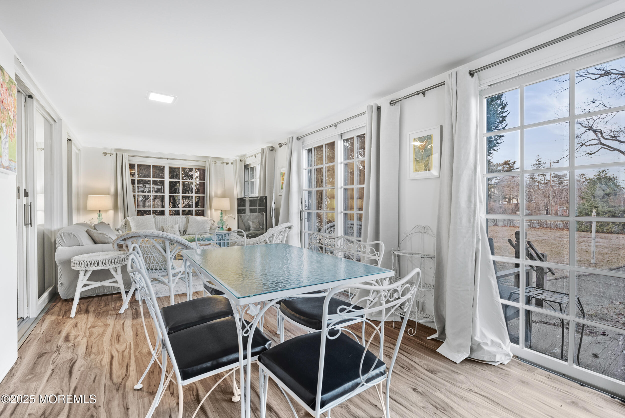90 Deal Esplanade Deal, NJ 07723 - Photo 20 of 25 a view of a dining room with furniture and wooden floor
