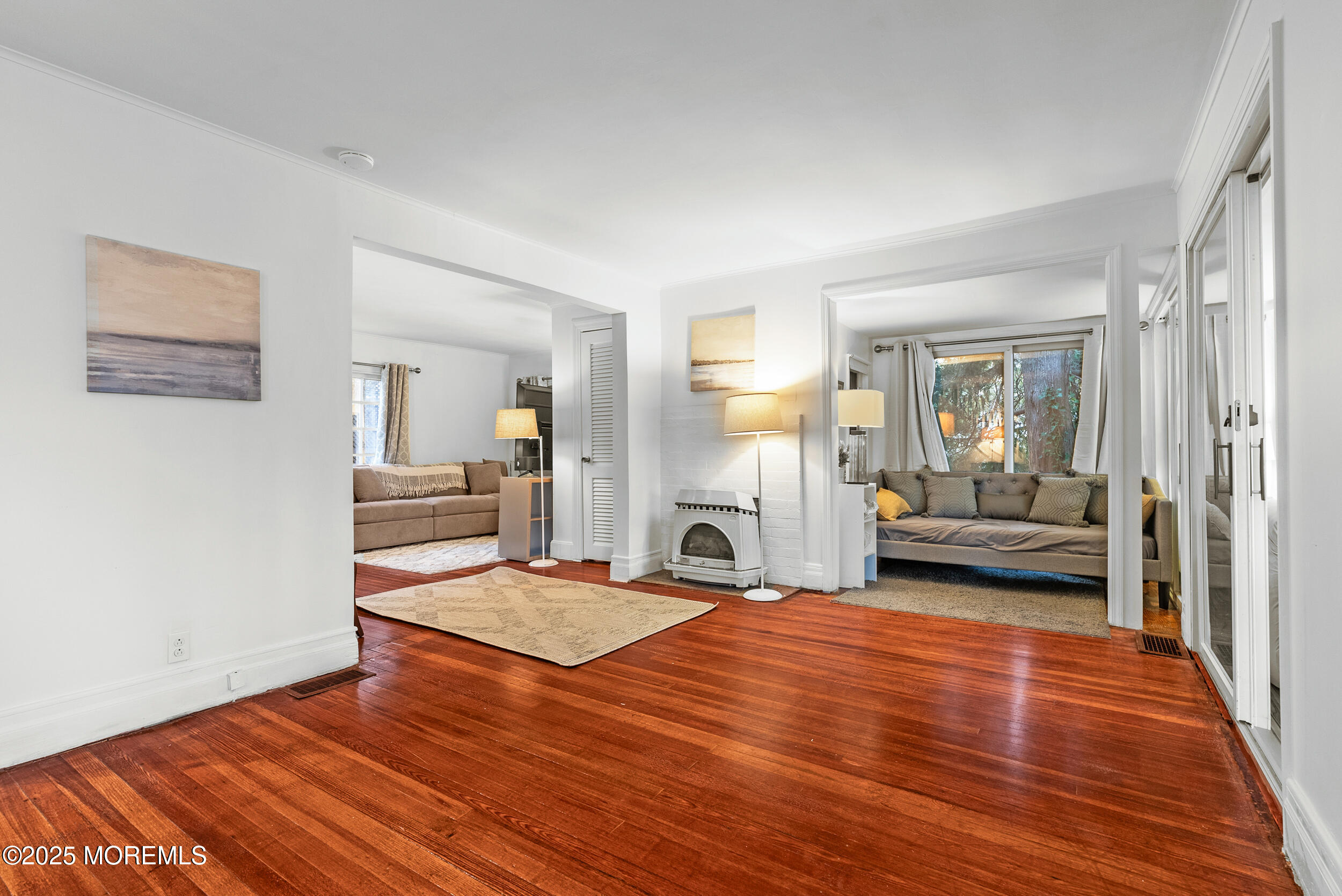 90 Deal Esplanade Deal, NJ 07723 - Photo 2 of 25 a view of a living room and kitchen