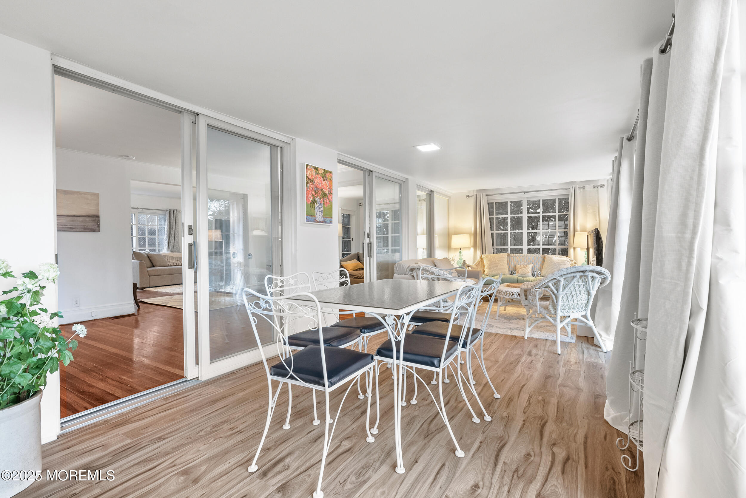 90 Deal Esplanade Deal, NJ 07723 - Photo 22 of 25 a view of a dining room with furniture and wooden floor