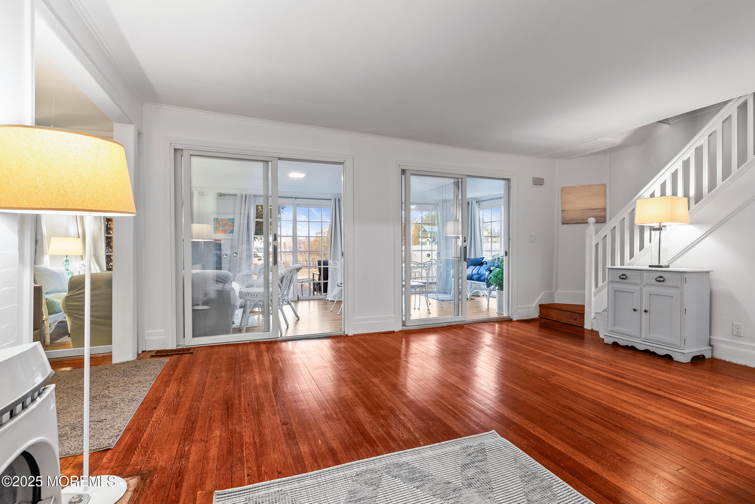 90 Deal Esplanade Deal, NJ 07723 - Photo 3 of 25 a view of livingroom with furniture and wooden floor