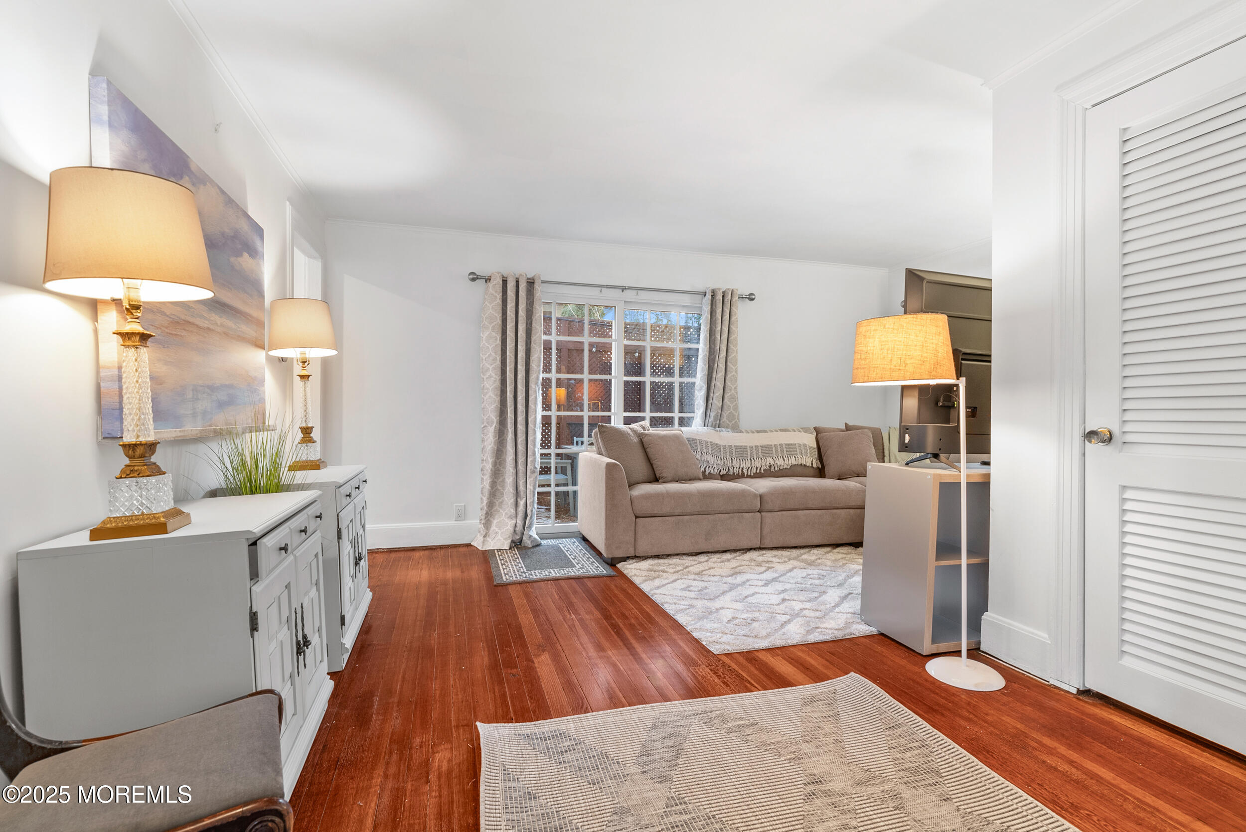 90 Deal Esplanade Deal, NJ 07723 - Photo 5 of 25 a living room with furniture and a lamp