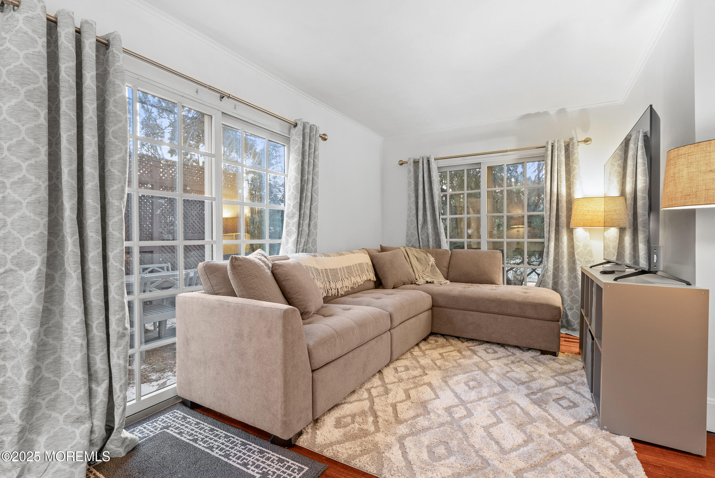 90 Deal Esplanade Deal, NJ 07723 - Photo 6 of 25 a living room with furniture and a large window