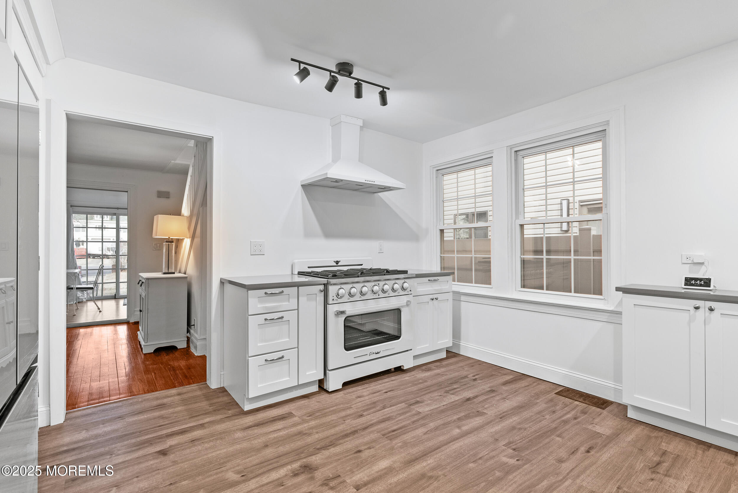 90 Deal Esplanade Deal, NJ 07723 - Photo 8 of 25 a kitchen with a stove top oven and sink