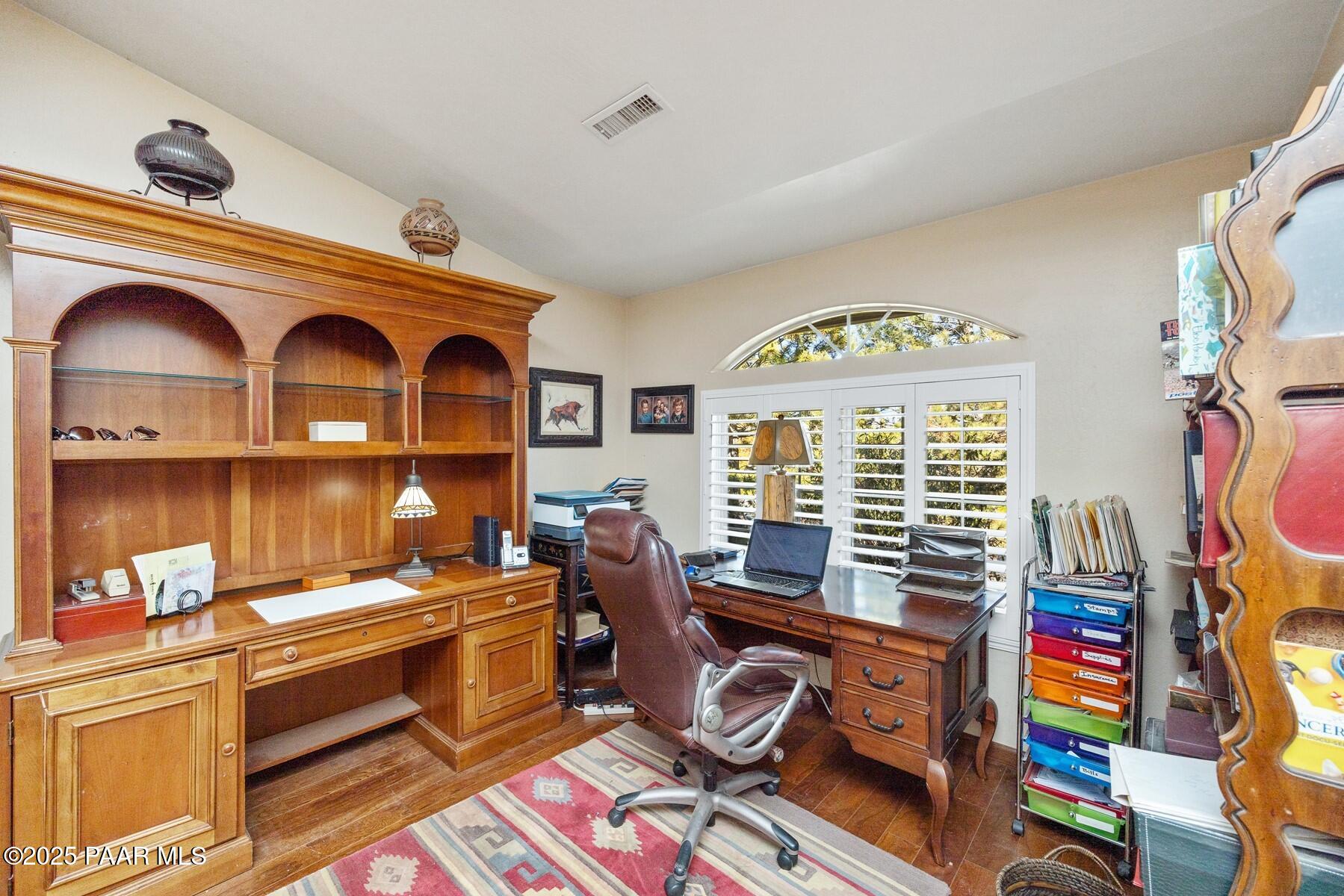 1614 Eagle Mountain Drive Prescott, AZ 86301 - Photo 7 of 8 a livingroom with workspace and a window