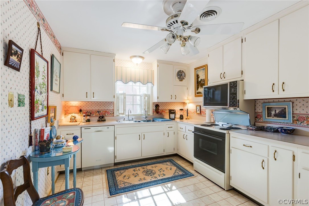 6161 River Road, Unit 37 Richmond, VA 23226 - Photo 12 of 24 a kitchen with granite countertop appliances cabinets and a sink