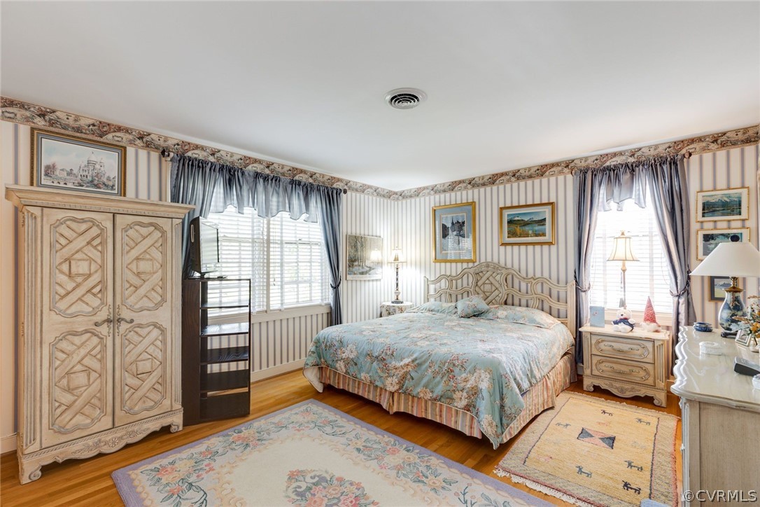 6161 River Road, Unit 37 Richmond, VA 23226 - Photo 17 of 24 a bedroom with a large bed and a window
