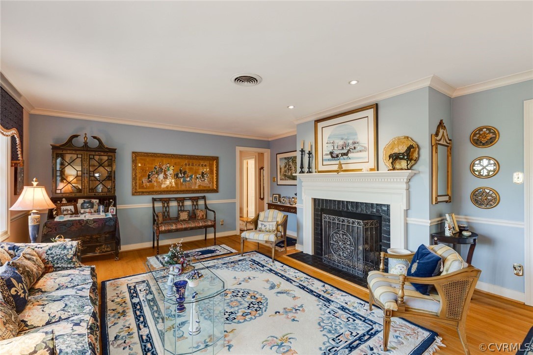 6161 River Road, Unit 37 Richmond, VA 23226 - Photo 5 of 24 a living room with furniture and a fireplace