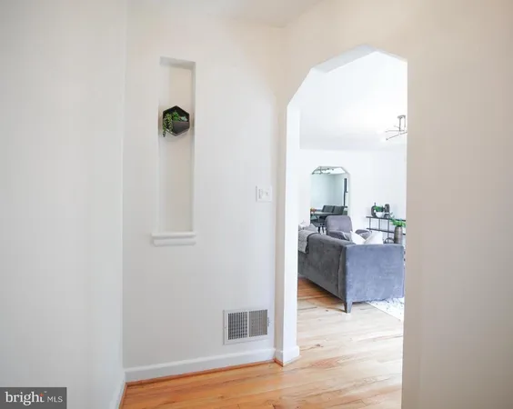 a view of a bedroom from a hallway