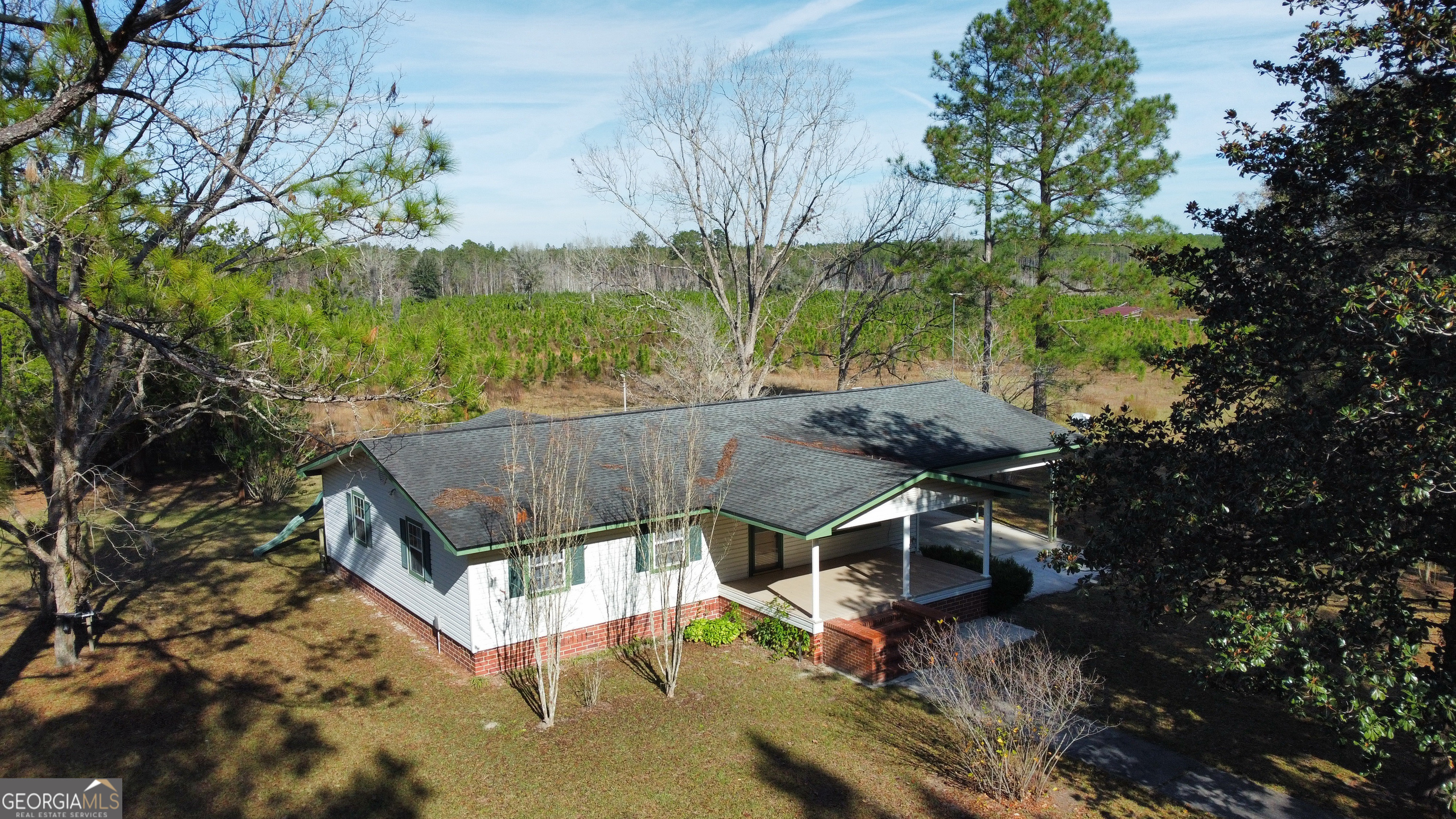 7755 River Road Folkston, GA 31537 - Photo 1 of 1 a view of a patio in backyard