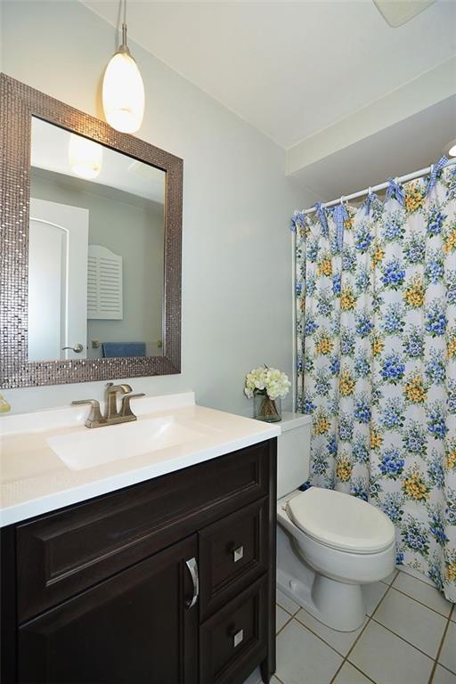 9372 Hilliard Road Pittsburgh, PA 15237 - Photo 14 of 24 Hall bath has been refreshed with vanity, neutral paint and mirror.