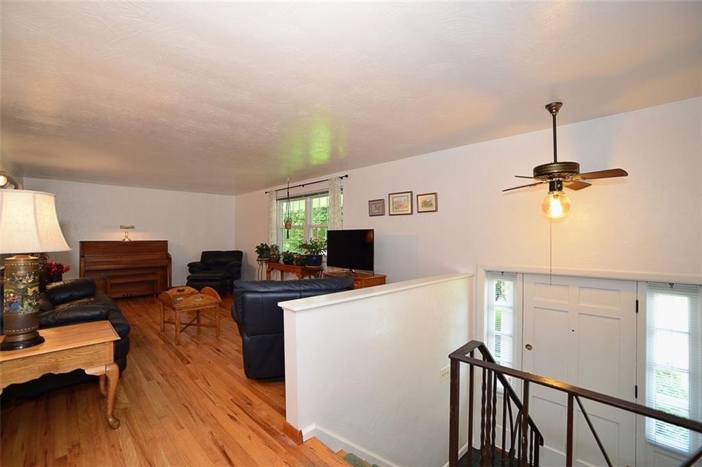 9372 Hilliard Road Pittsburgh, PA 15237 - Photo 3 of 24 Gleaming hardwoods grace the spacious living room.