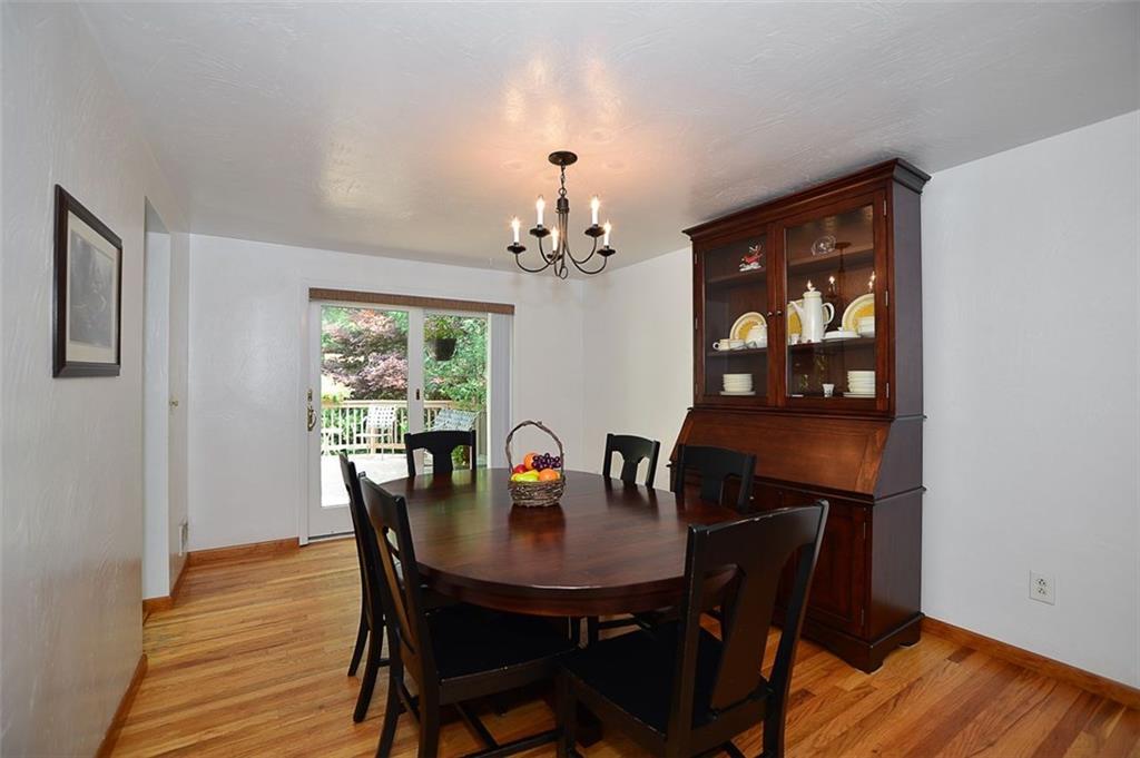 9372 Hilliard Road Pittsburgh, PA 15237 - Photo 5 of 24 Dining room with sliding door to large deck and yard.