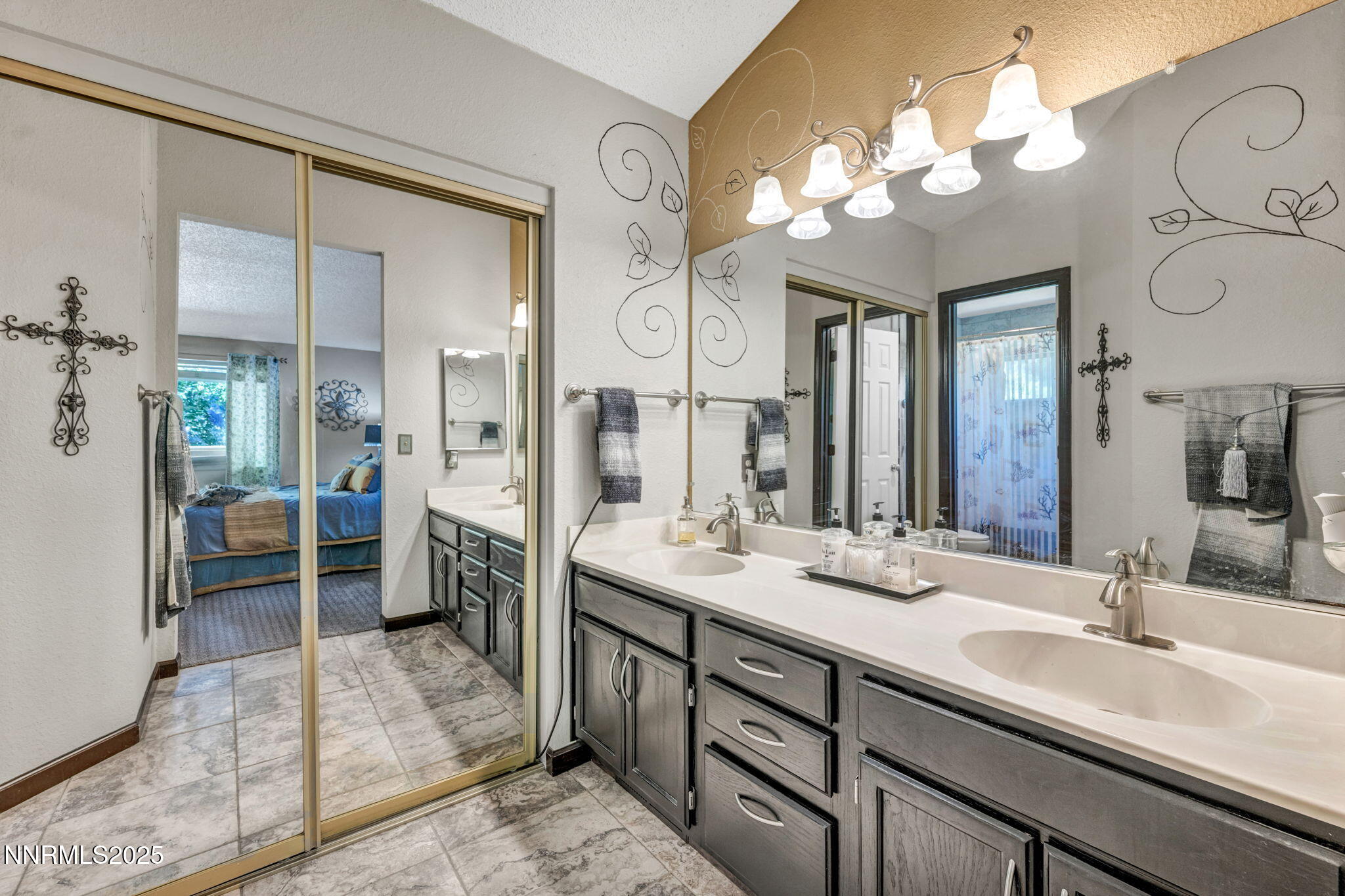 4655 Mendota Court Reno, NV 89509 - Photo 26 of 51 a spacious bathroom with a double vanity sink shower and a mirror