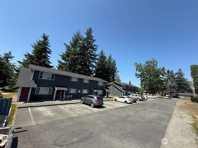 a view of street with parked cars