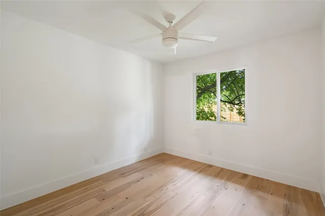 a view of a livingroom with wooden floor