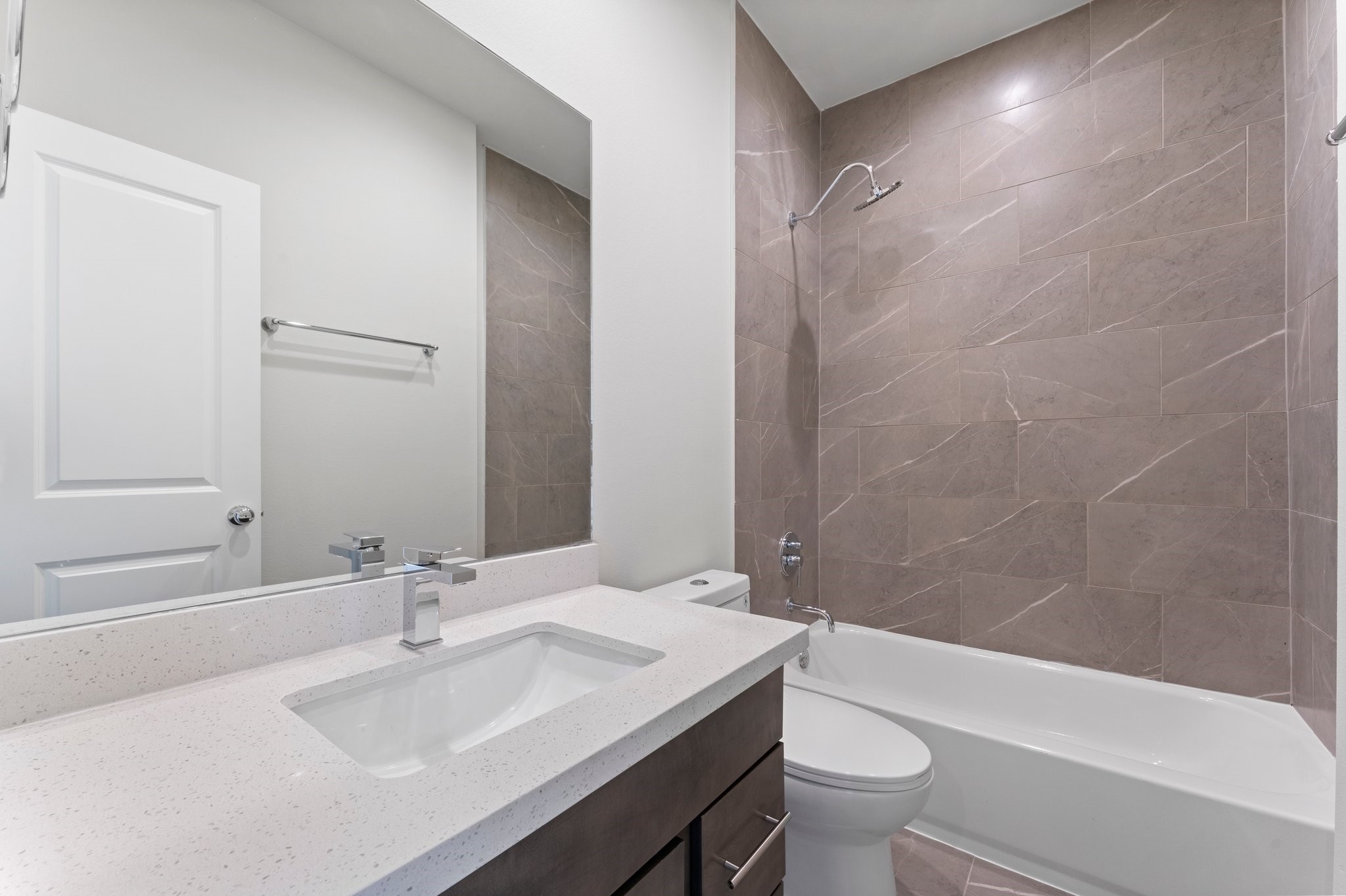 5904 Jasper Jones Way Houston, TX 77091 - Photo 14 of 37 a bathroom with a sink a toilet and shower