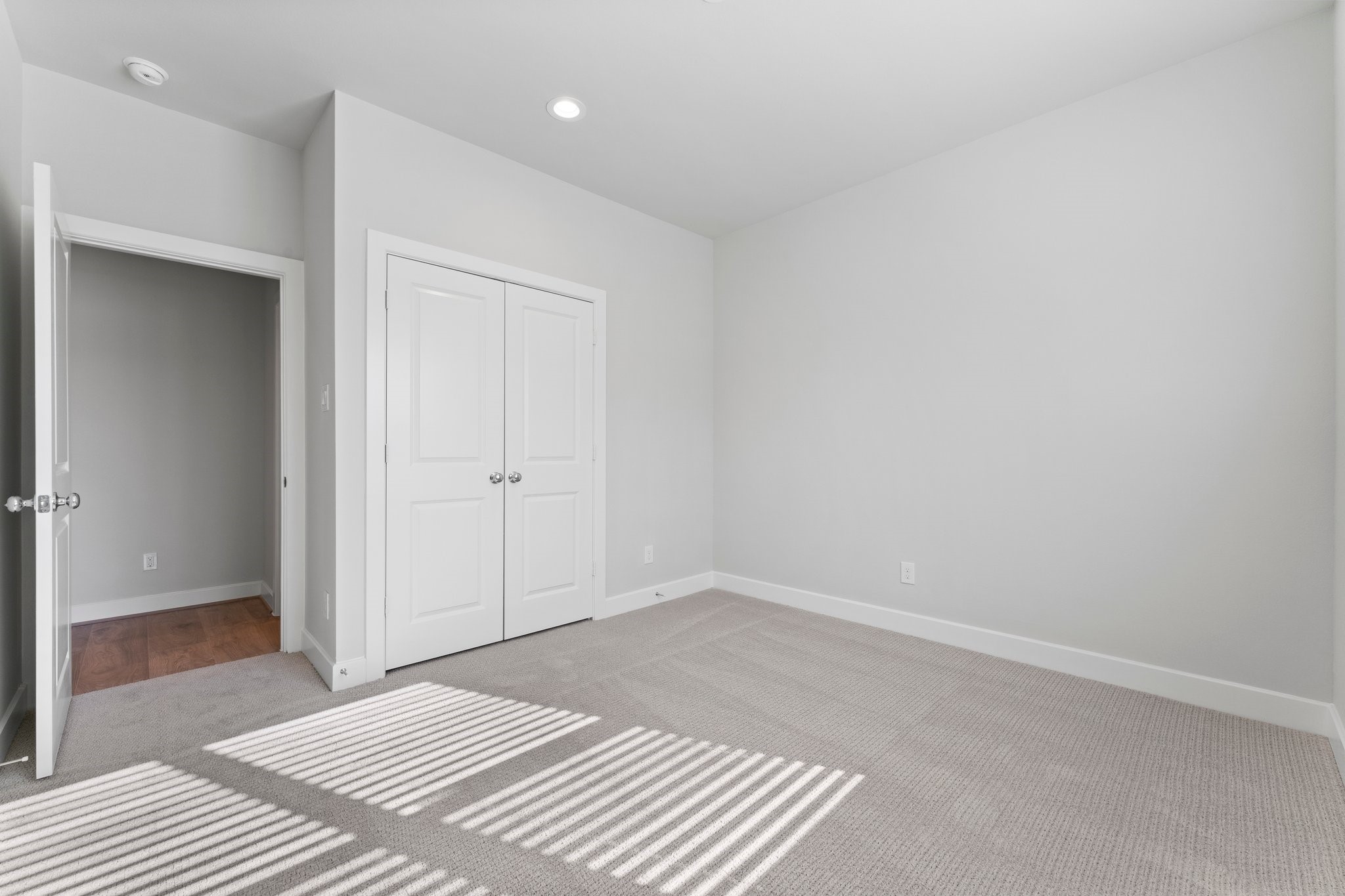 5904 Jasper Jones Way Houston, TX 77091 - Photo 16 of 37 a view of a room with wooden floor and closet