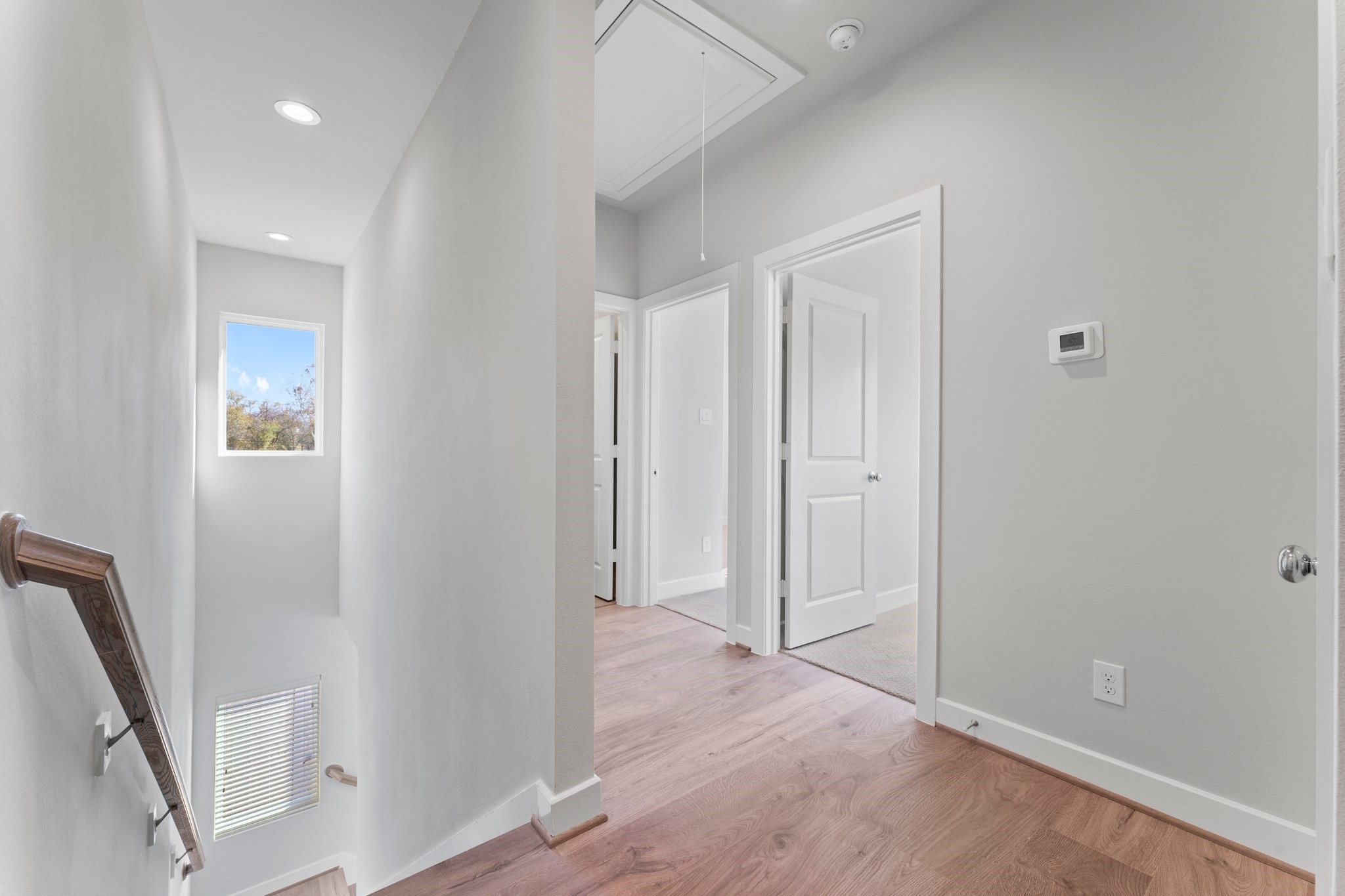 5904 Jasper Jones Way Houston, TX 77091 - Photo 21 of 37 an empty room with wooden floor and entrance