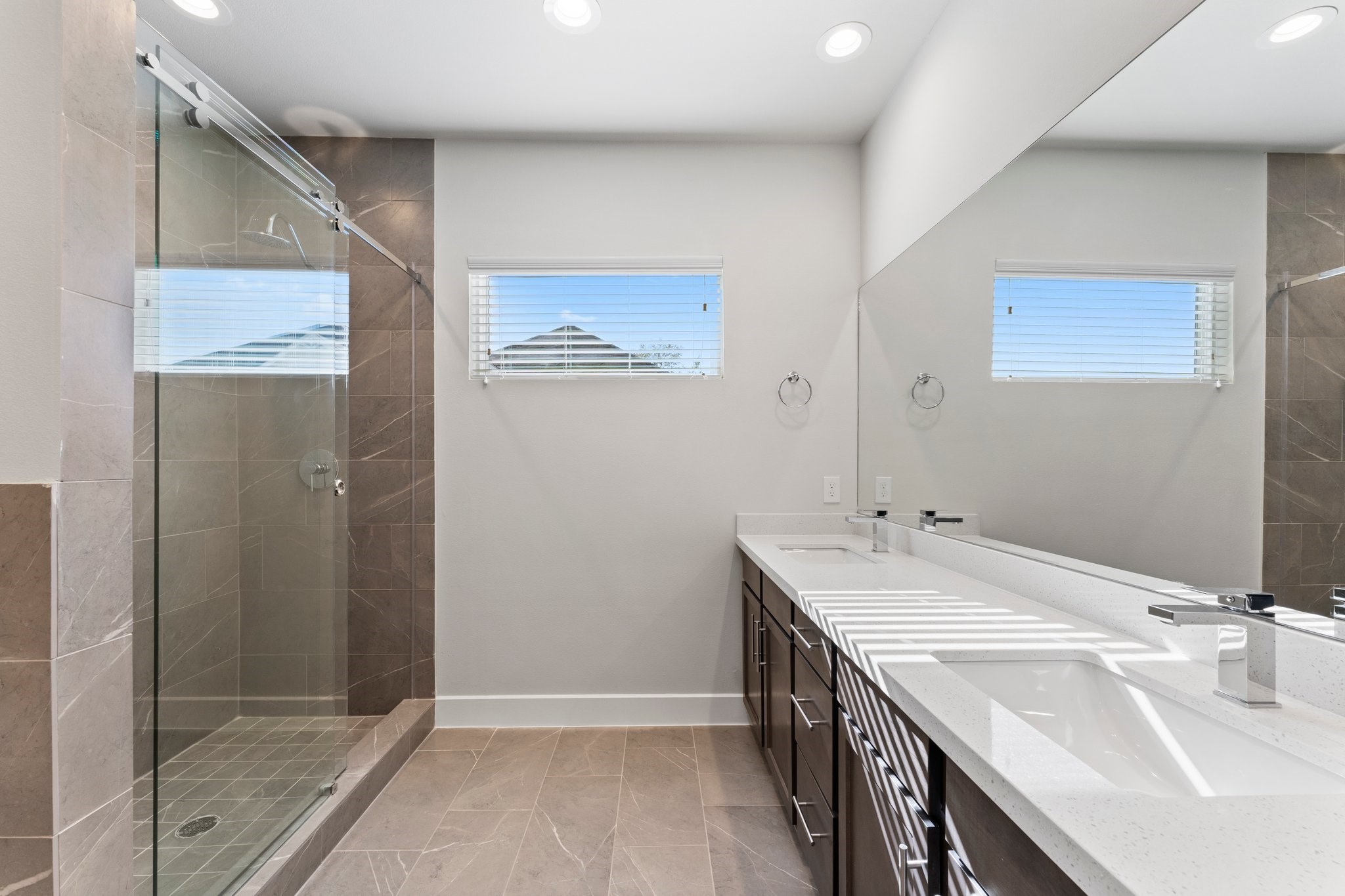 5904 Jasper Jones Way Houston, TX 77091 - Photo 29 of 37 a bathroom with 2 sink and a mirror