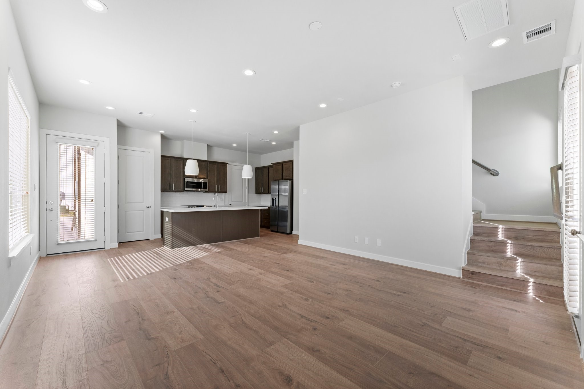 5904 Jasper Jones Way Houston, TX 77091 - Photo 4 of 37 a view of kitchen with wooden floor