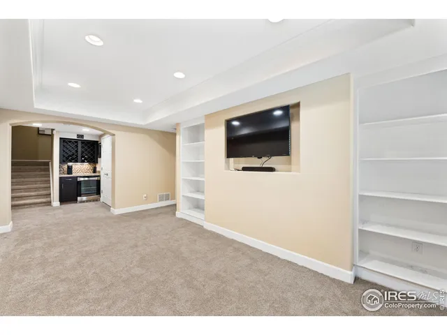 a view of a livingroom with a flat screen tv