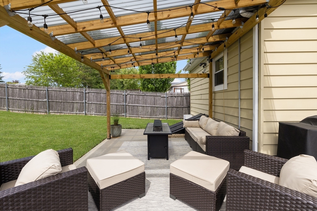 69 Denver Street Fall River, MA 02721 - Photo 9 of 35 a view of a patio with a yard