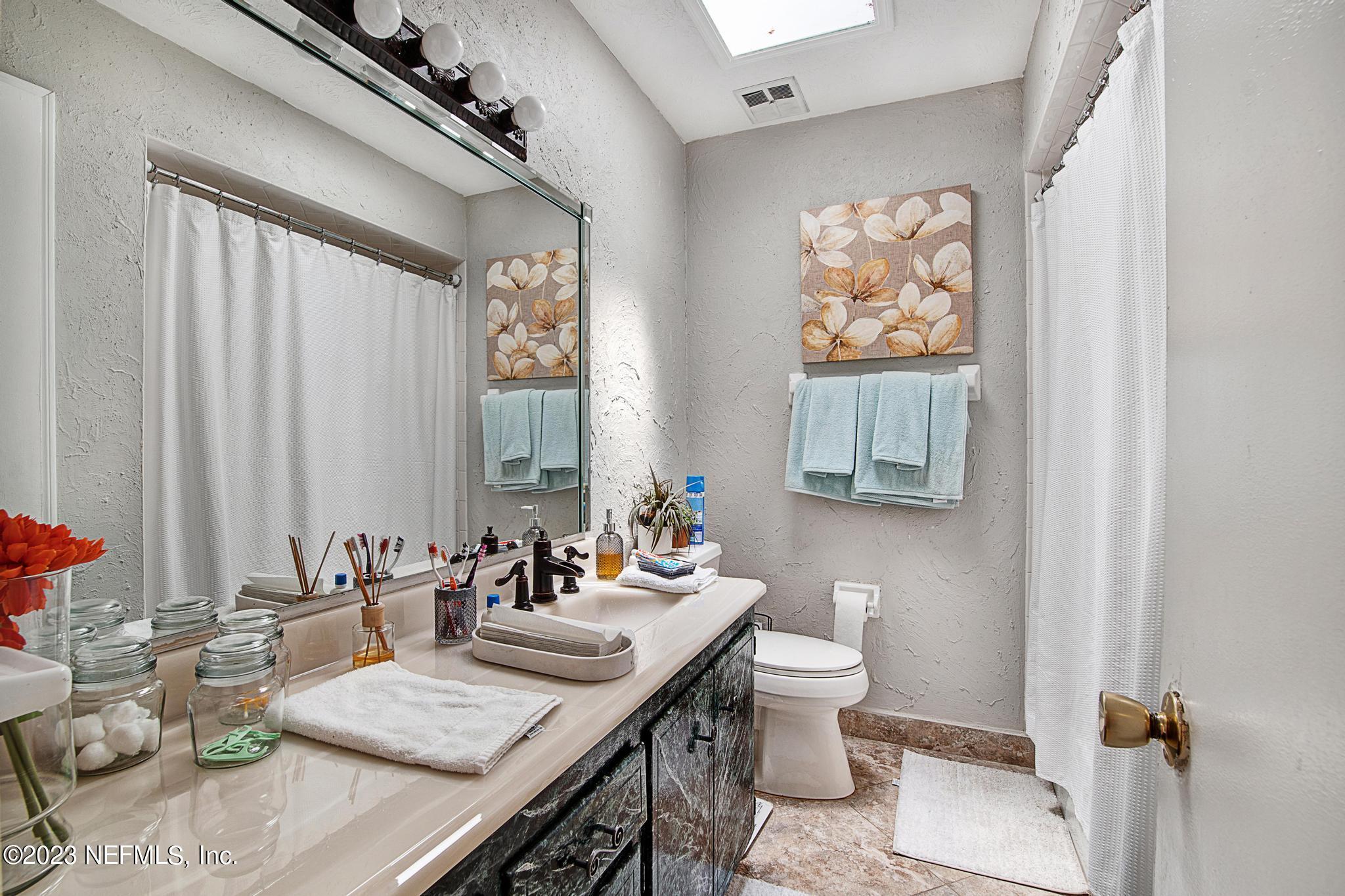 2411 Aquarius Road Orange Park, FL 32073 - Photo 13 of 24 a view of a dining room with furniture window and outside view