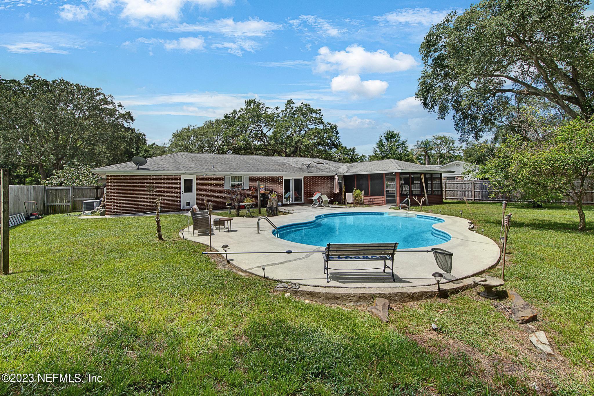2411 Aquarius Road Orange Park, FL 32073 - Photo 24 of 24 aerial view of a house with swimming pool and sitting area