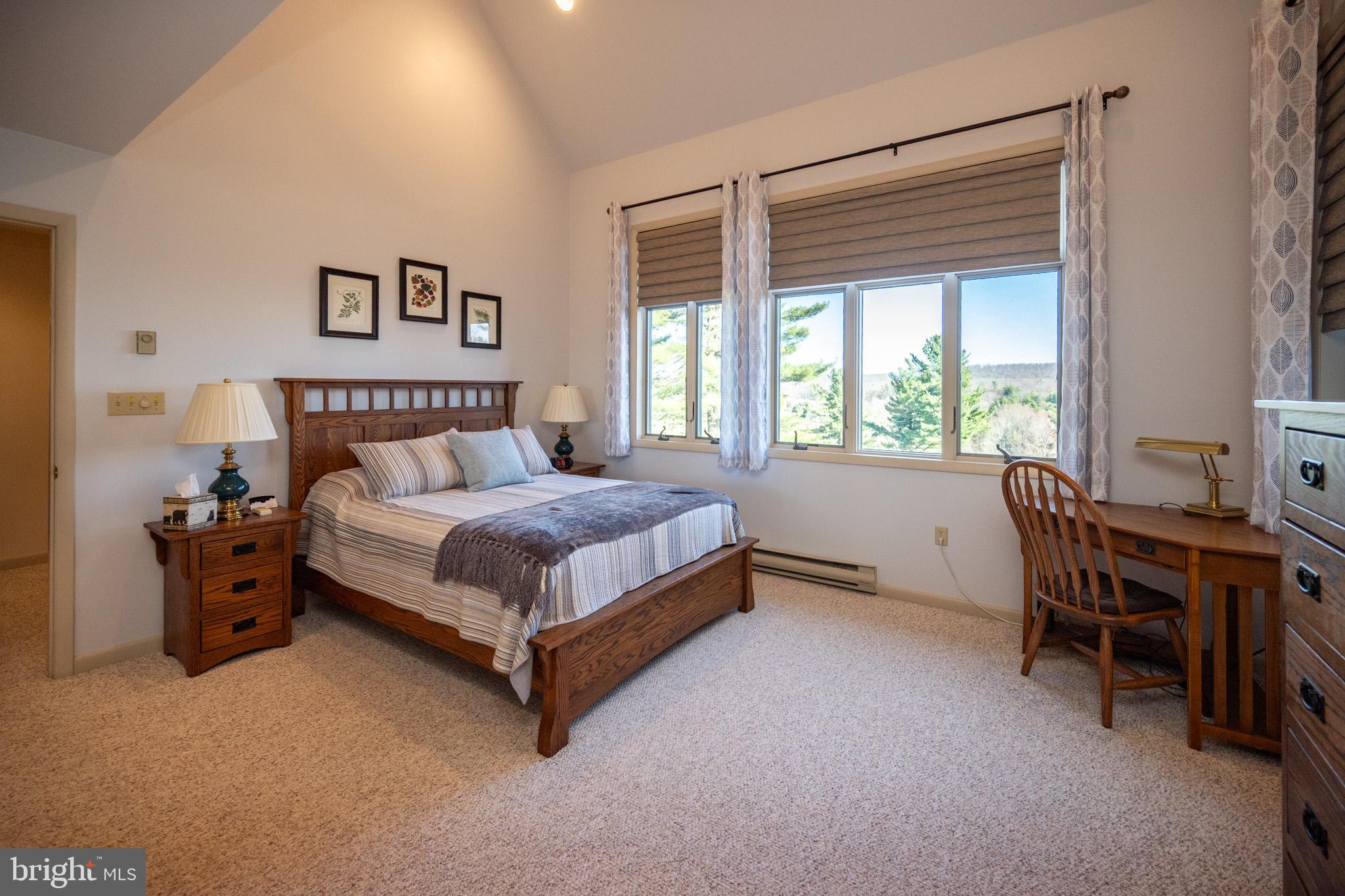 59 Glenview Road Swanton, MD 21561 - Photo 23 of 85 a bed room with a bed and a window