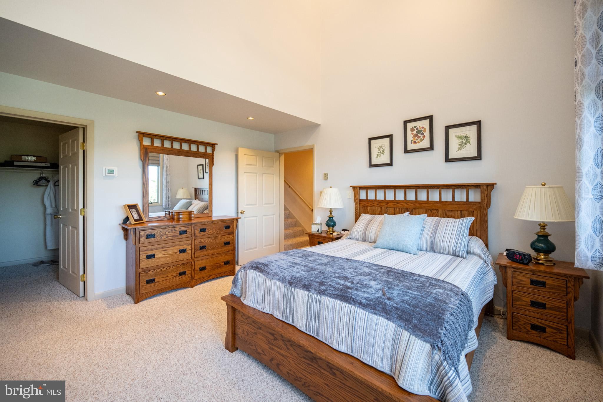 59 Glenview Road Swanton, MD 21561 - Photo 24 of 85 a bedroom with a bed and a dresser