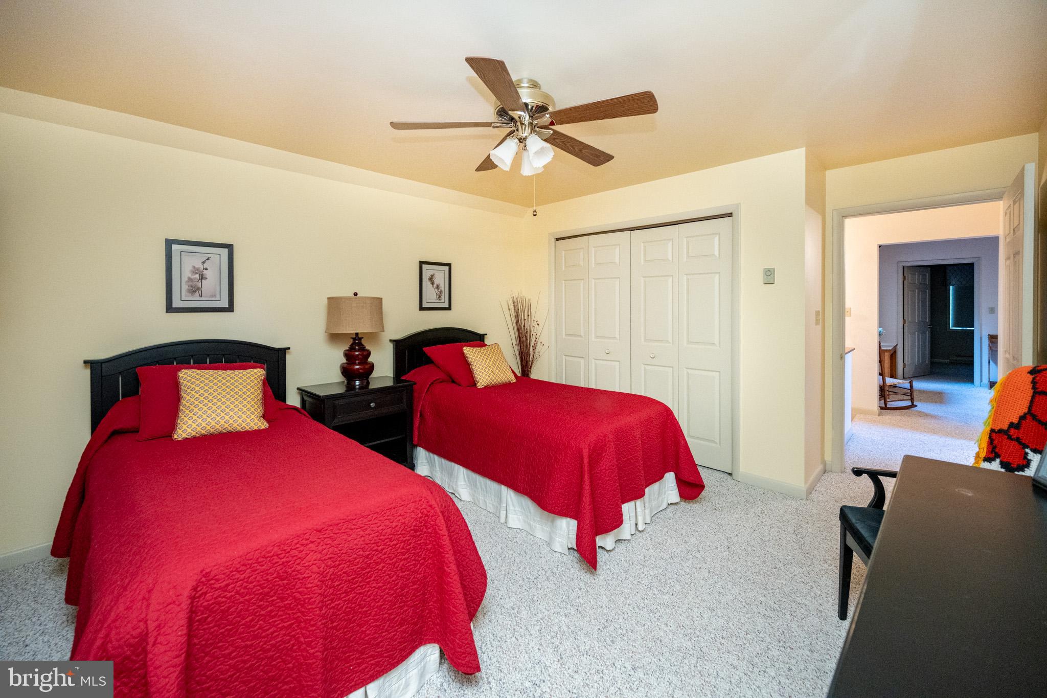59 Glenview Road Swanton, MD 21561 - Photo 37 of 85 a bedroom with two bed and a window